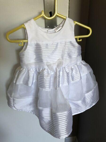 Wanted: White dress 6-12 months