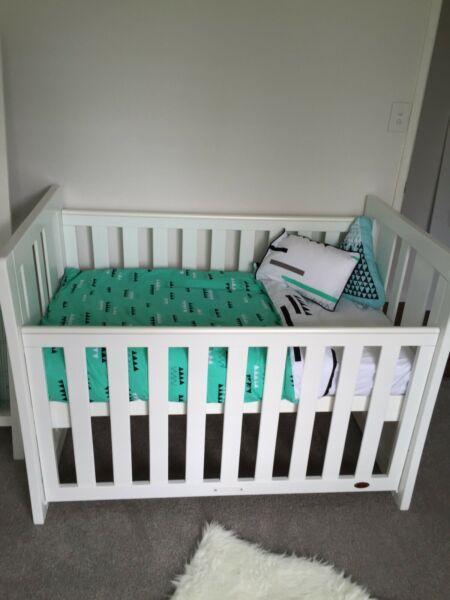 White wooden cot, change table and mattress