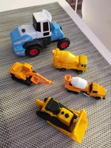 Five assorted toy vehicles, all for $1.00