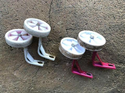 Small pink bike training wheels - 2x pairs, $10 each
