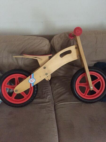 Wooden toddler balance bike