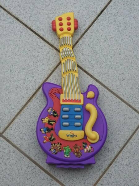 WIGGLES MUSICAL GUITAR.....Good Condition