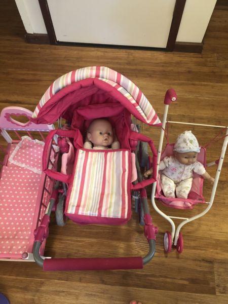 Toy cot and 2 prams with dolls included
