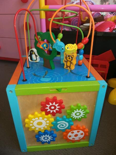 Kids activity cube with storage space