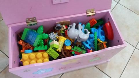Wooden toy box full of Duplo
