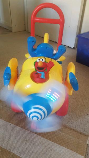 Elmo activity ride on push plane