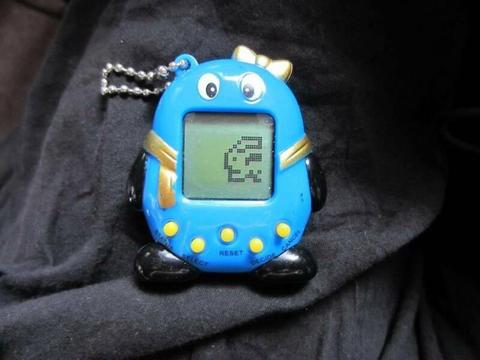 New backpack and tamagotchi electronic toy both for $20