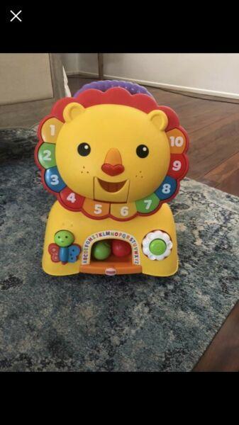 Fisher Price stride and ride Lion