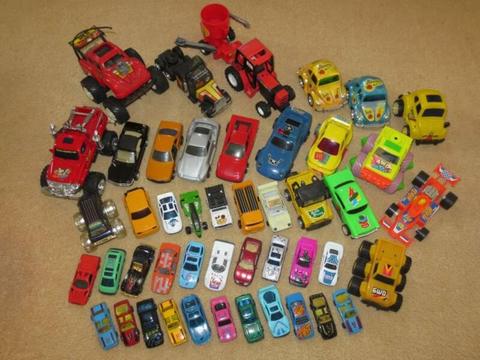 HEAPS OF ASSORTED CARS, TRUCKS AND OTHER VEHICLES