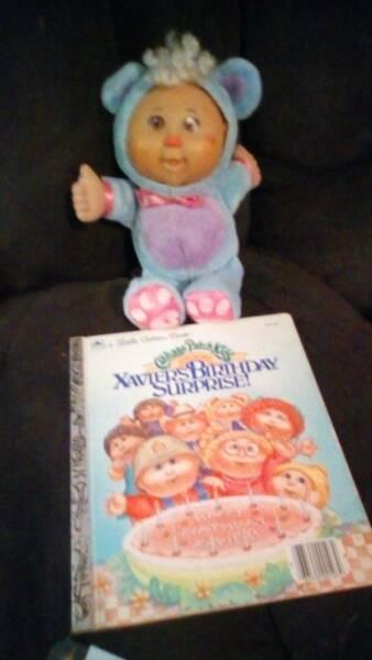 Cabbage patch doll and book