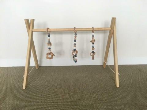 Baby Gym - wooden play gym with three silicone and wood toys