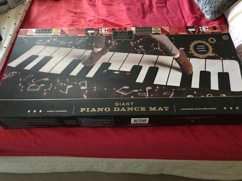 Giant piano dance mat