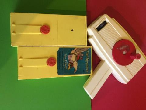 Vintage Fisher Price Movie Viewer Rescuers and snoopy cartridges