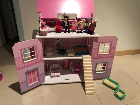 Wooden doll house and accessories