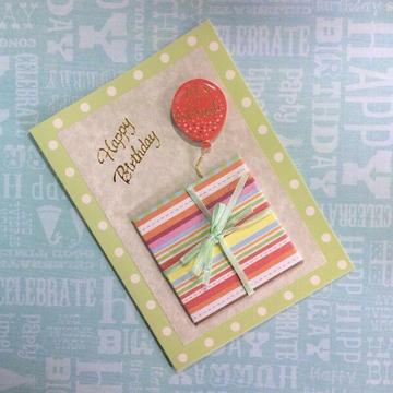 Green Birthday Card with Present and Red Balloon