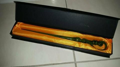 Harry Potter wand and assorted toys