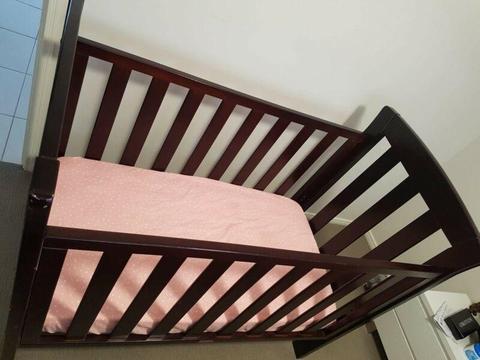 Baby crib plus the mattress and 3 sheets for free