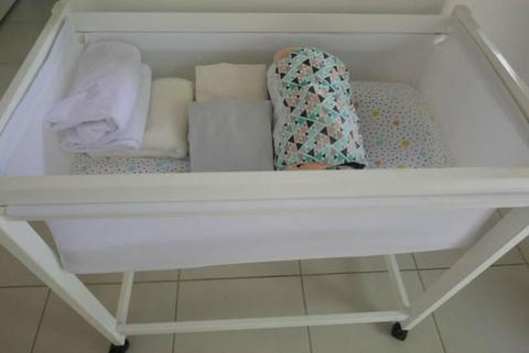 Baby Bargain. Bassinet with Bedding and Baby Clothes