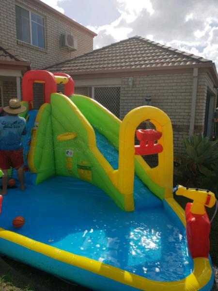 Inflatable water slide with paddling pool