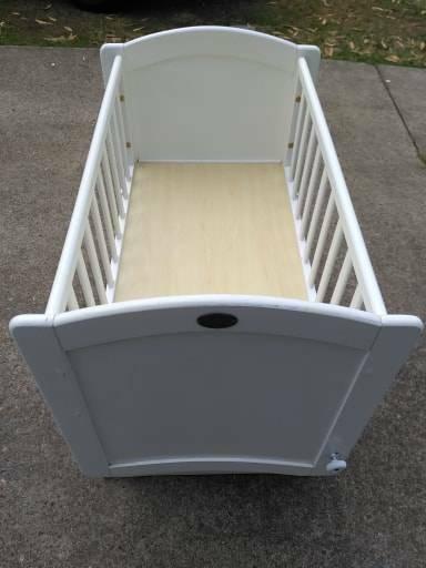 Cots4tots brand fixed or swinging bassinet in white timber