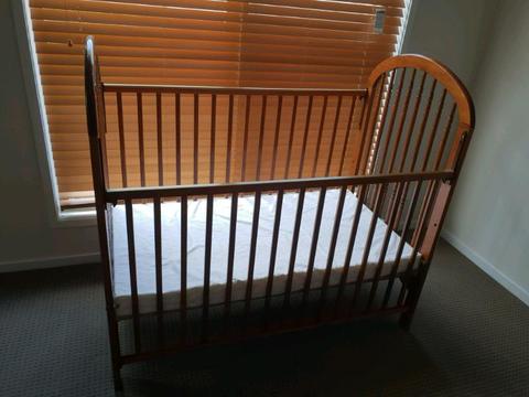 Timber cot with brand new mattress