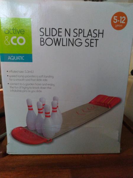 Slide and splash bowling set