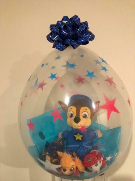 Paw patrol gifts in a balloon great for a birthday