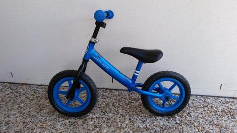 Childrens blue balance bike