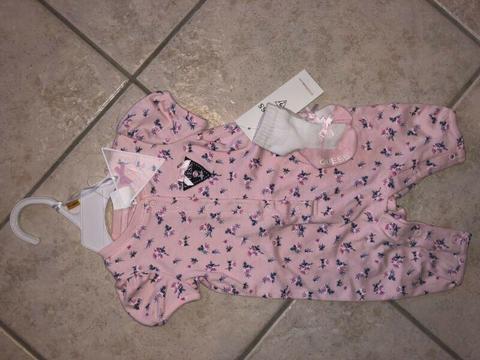 GUESS kids baby Playsuit with matching socks. Size 0-4months