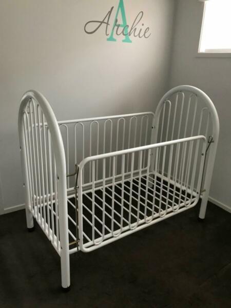 White metal cot and mattress