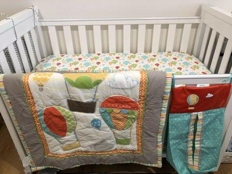 4 piece cot bed set (quilt, fitted sheet, nappy stacker, dust ruffle)