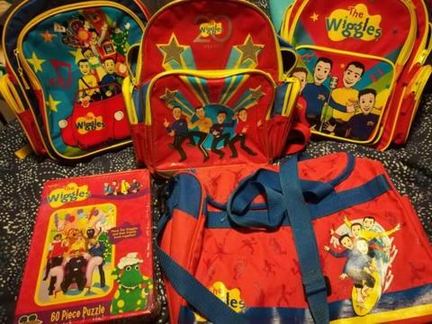 Wiggles bags, puzzle, guitars, tail and swords, books