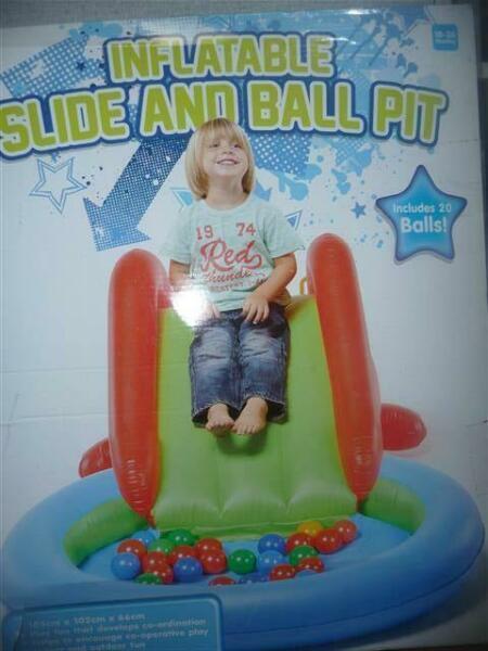 toddler inflatable ballpit slide and bag of balls