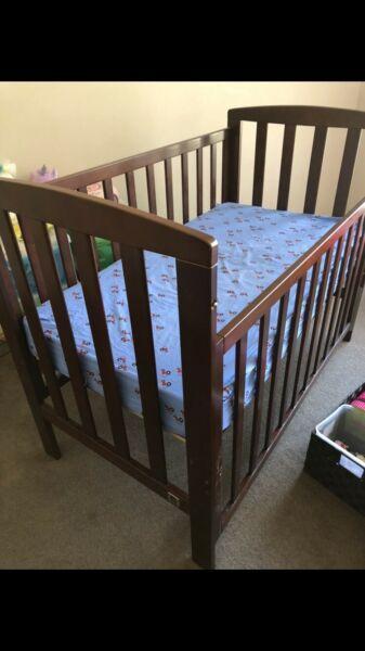 Dark wooden cot, toy box and book shelf