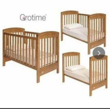 Cot converts to toddler bed Grotime