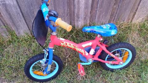12 inch paw patrol bike,sun fade. Can deliver for extra!