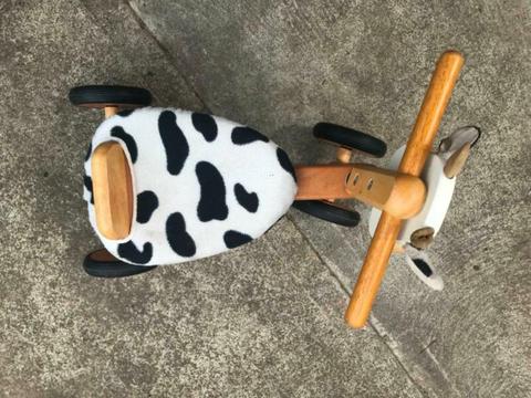 Wooden ride on cow