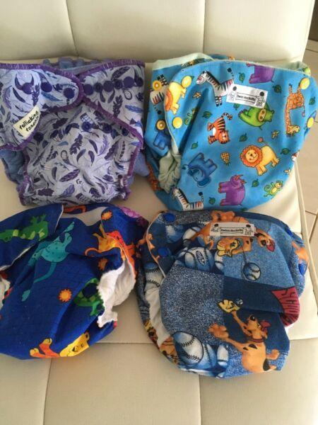 4 x Assorted washable , Reusable Nappies. Size 1