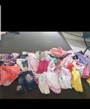Bag full of baby girl clothes