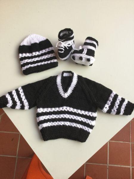 Hand knitted Collingwood footy outfit for a 0-3months