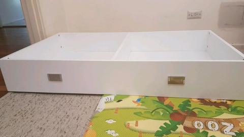 White cot storage drawer