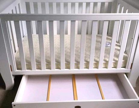 white baby cot with beds