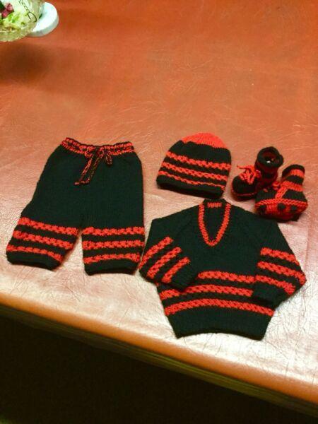 My hand knitted Essendon set for a baby 0-3 months