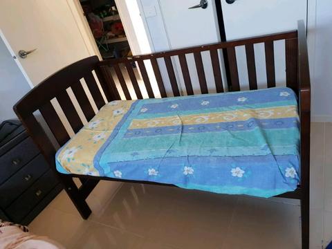 Baby cot includes mattress