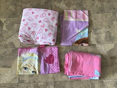 Barbie doona and pillow cases plus a fairy doona cover