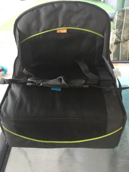 Baby portable booster seat on chairs