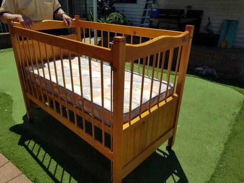 Used baby cot in great condition with mattress