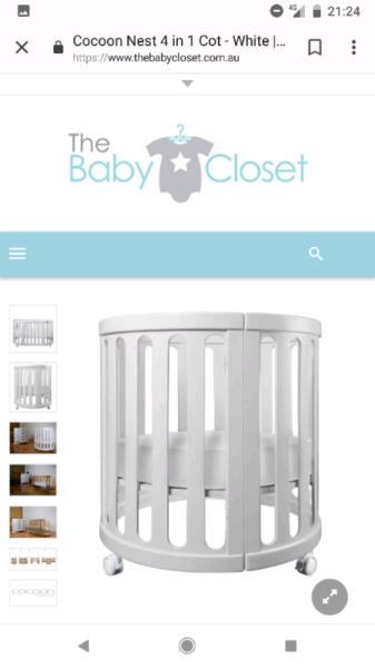 Cot. White cocoon nest cot
