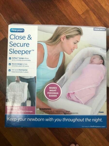 FIRST YEARS CLOSE AND SECURE SLEEPER
