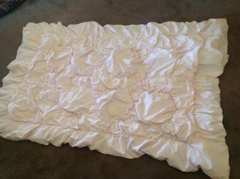 Decorative single bed or cot cover